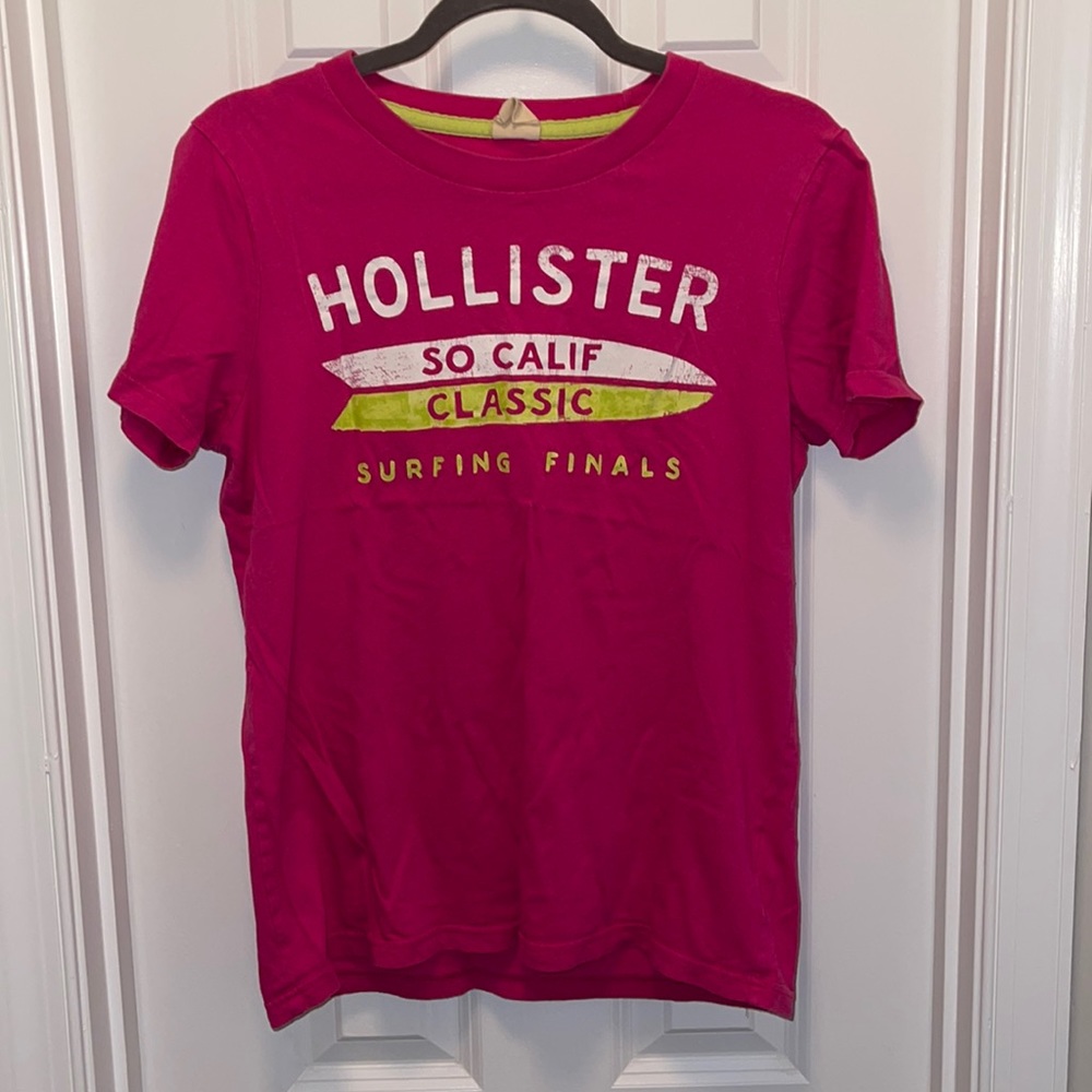 Woman’s Pink Hollister shirt sized Medium